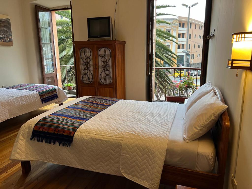 A bed or beds in a room at Mía Leticia