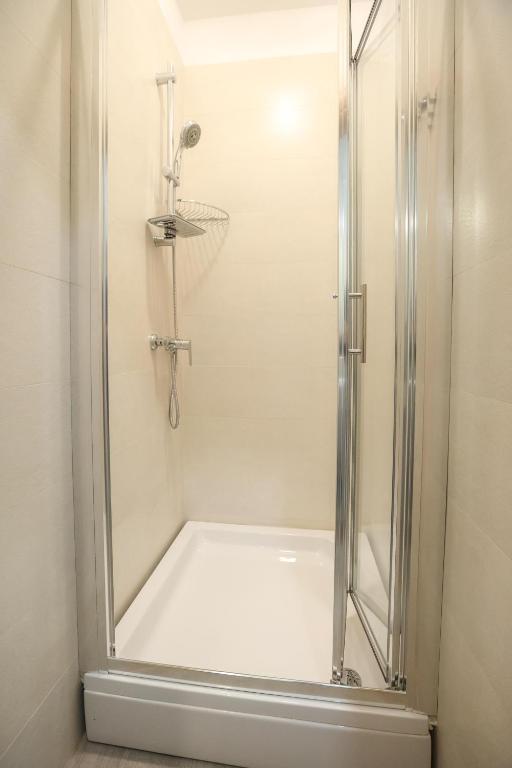 Kúpeľňa v ubytovaní Apartmani Kolovare