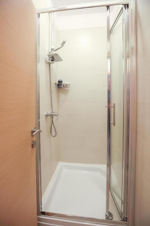 Kúpeľňa v ubytovaní Apartmani Kolovare