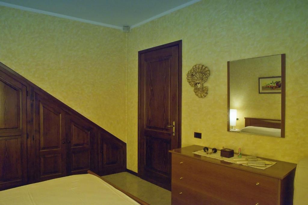 A bed or beds in a room at Rustico Giorgia