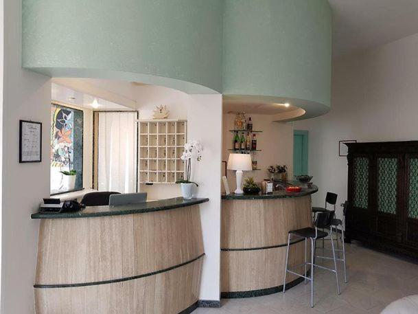 Kuchyň nebo kuchyňský kout v ubytování Hotel La Plancia