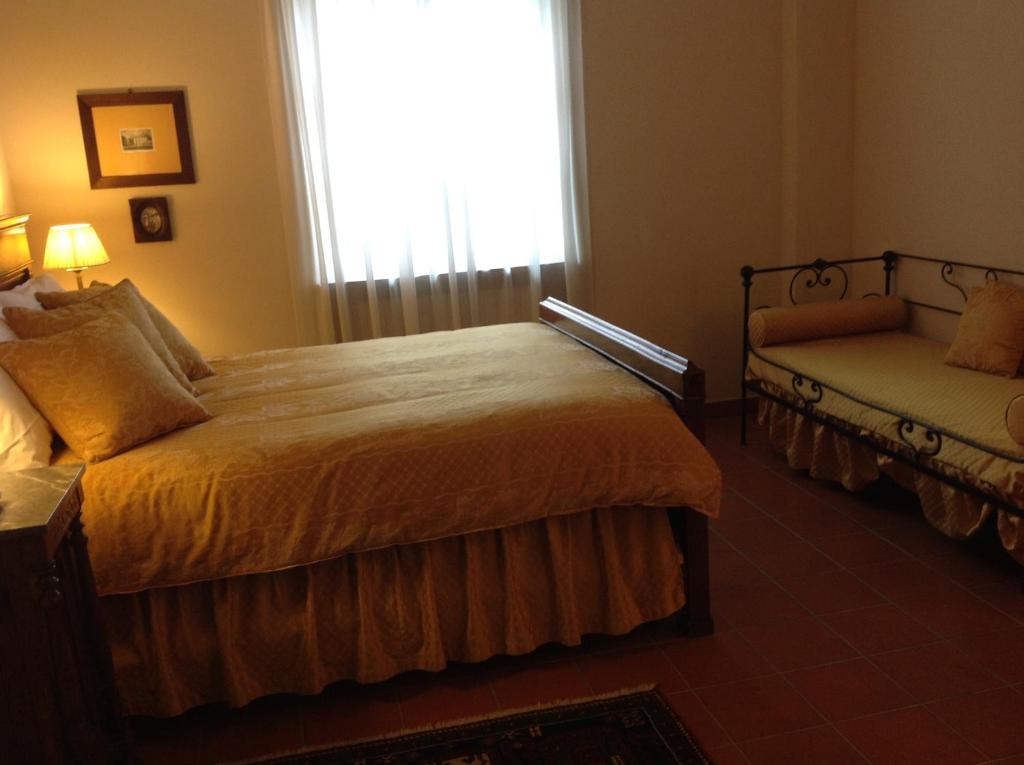 Posteľ alebo postele v izbe v ubytovaní Agriturismo La Casa in Collina