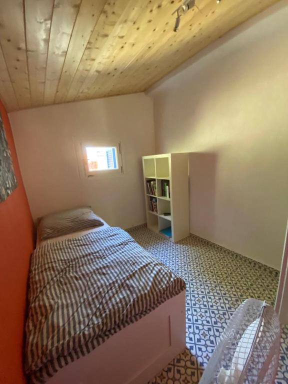 Postel nebo postele na pokoji v ubytování Villa Vrachos - uriges Steinhaus -