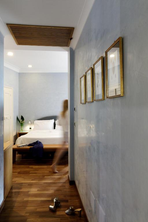 Postel nebo postele na pokoji v ubytování Hotel Palazzo Papaleo