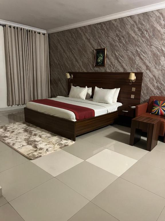 Postel nebo postele na pokoji v ubytování Posh Hotel and Suites Victoria Island