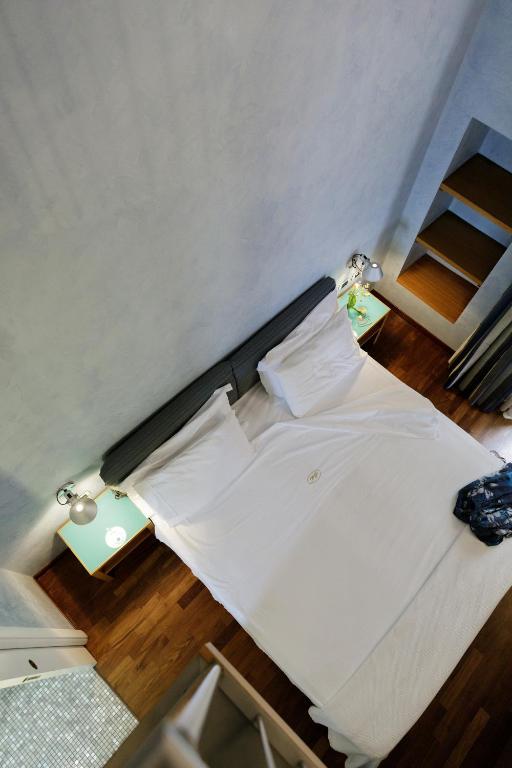 Postel nebo postele na pokoji v ubytování Hotel Palazzo Papaleo