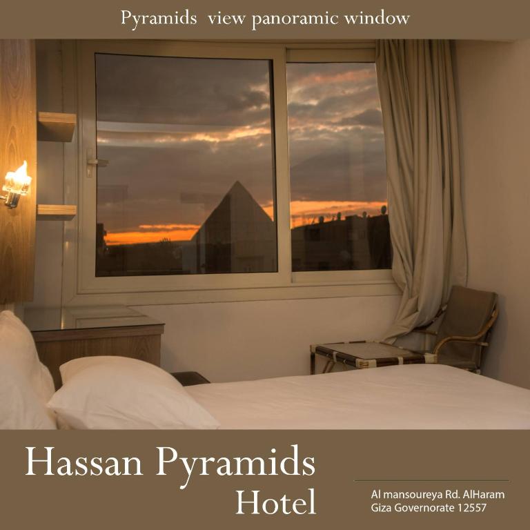 Postel nebo postele na pokoji v ubytování Hasan Pyramids Hotel