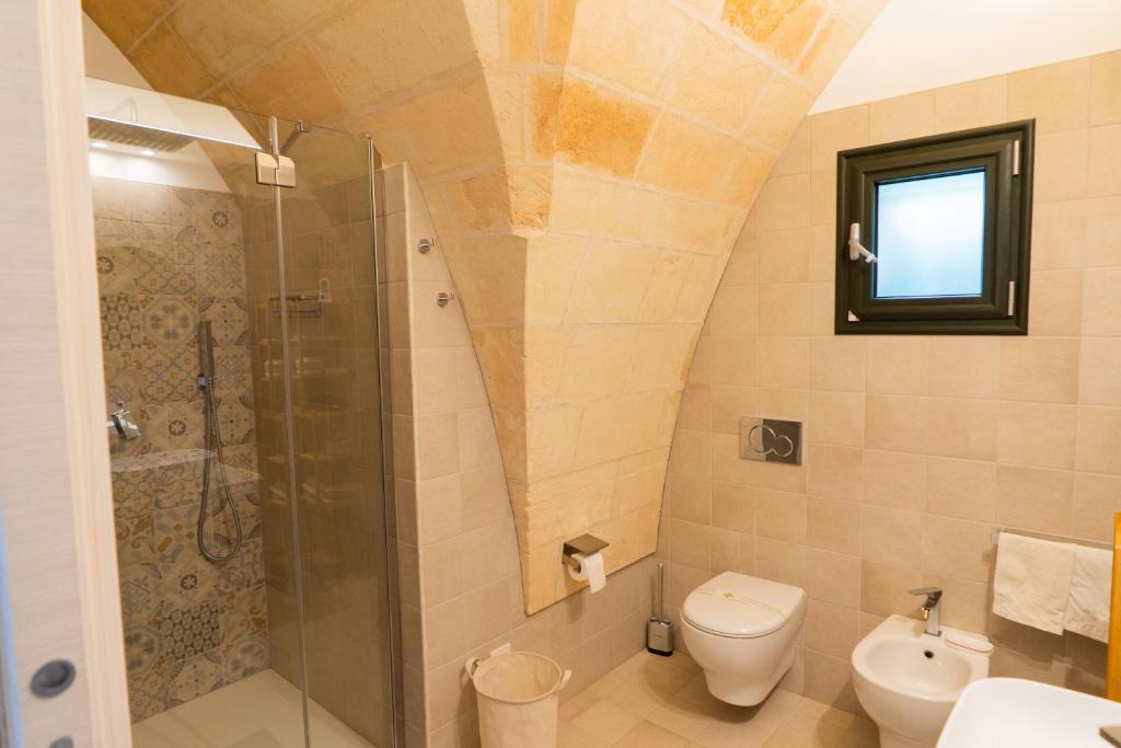 Koupelna v ubytování Relais La Giara