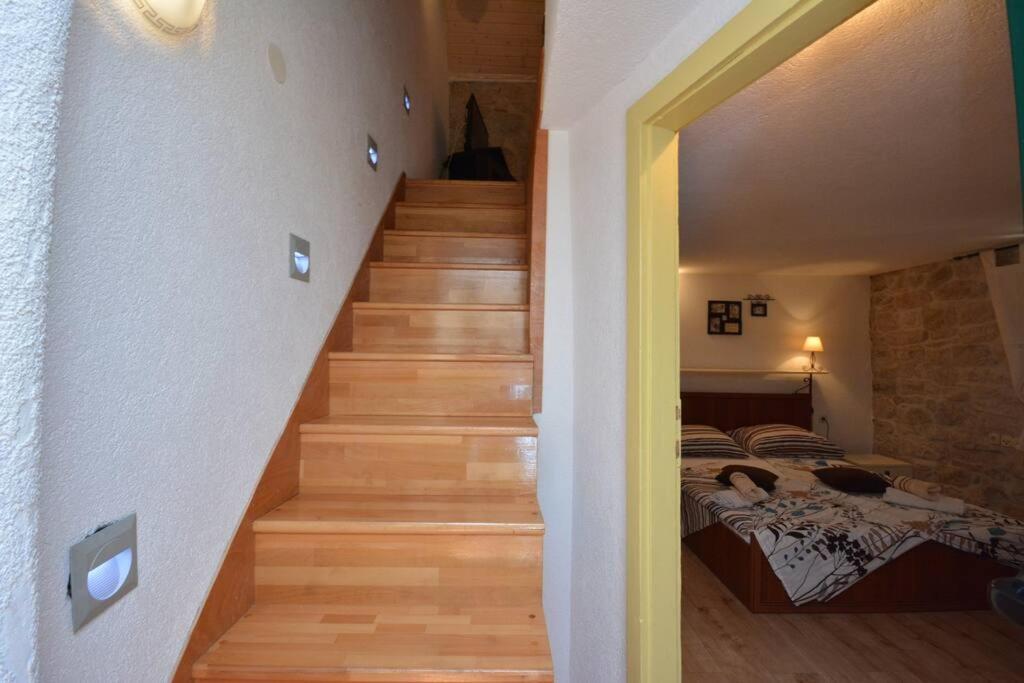 Postel nebo postele na pokoji v ubytování apartment GLORIA - old city center