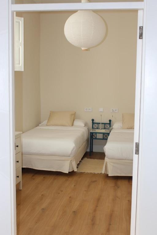 Postel nebo postele na pokoji v ubytování La Casona de Galdós