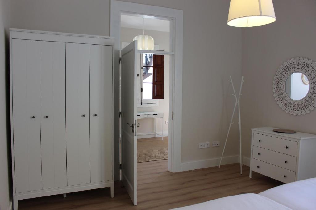 Postel nebo postele na pokoji v ubytování La Casona de Galdós