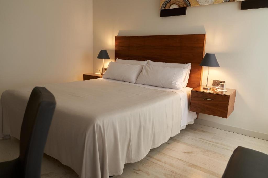 Postel nebo postele na pokoji v ubytování El Hostal de Violeta