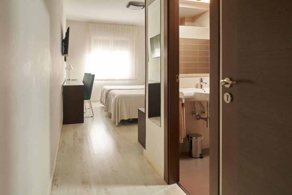 Postel nebo postele na pokoji v ubytování El Hostal de Violeta