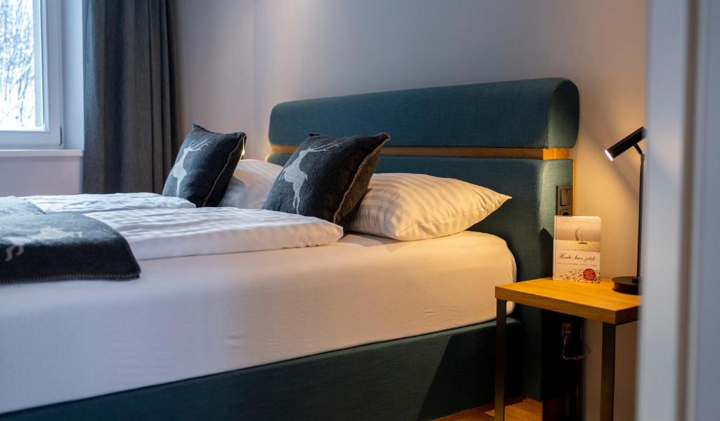 Voodi või voodid majutusasutuse Hotel Residenz Hochalm - Joker Card Partner toas