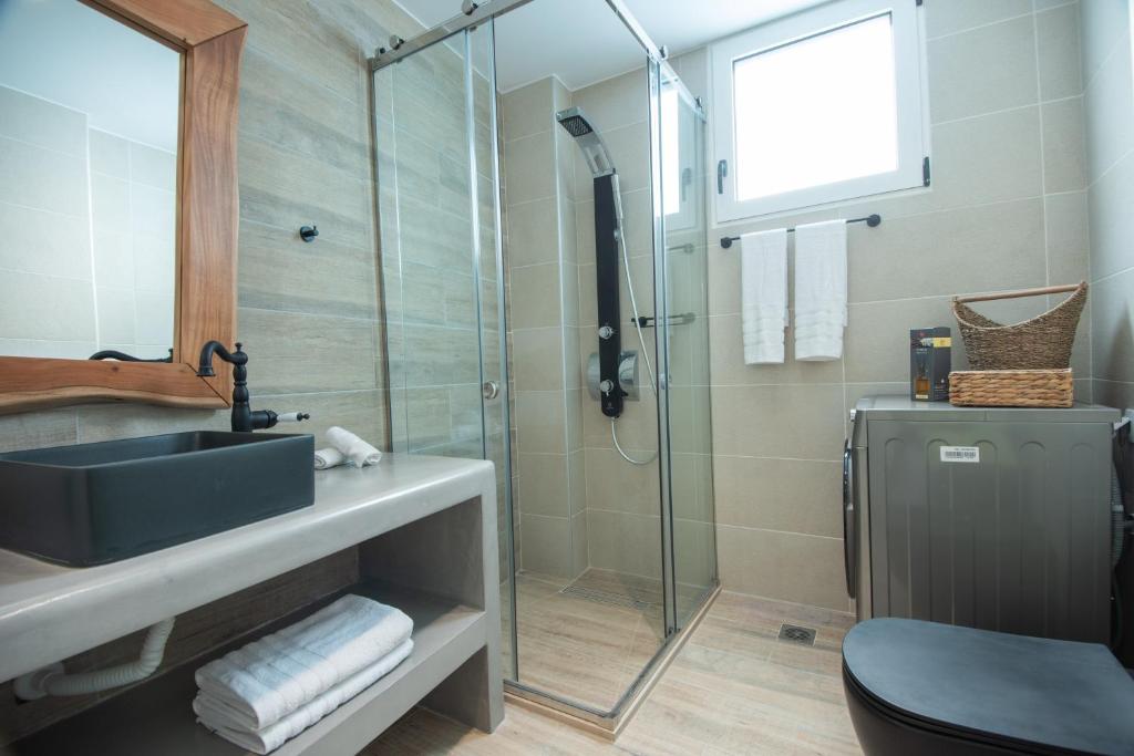 Kúpeľňa v ubytovaní Ammos Lux Apartments Crete