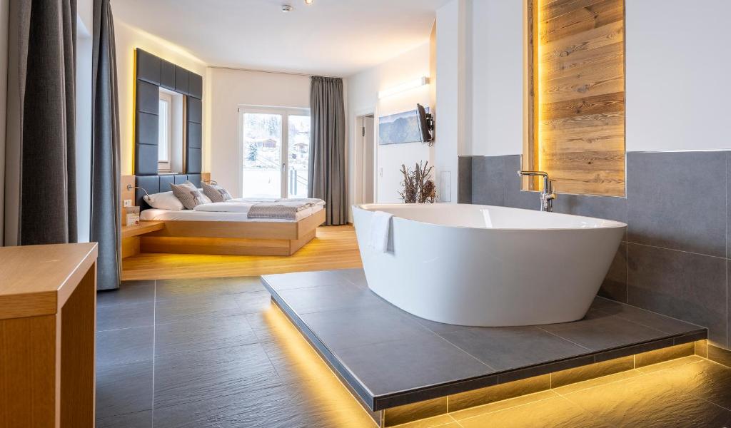 Voodi või voodid majutusasutuse Hotel Residenz Hochalm - Joker Card Partner toas