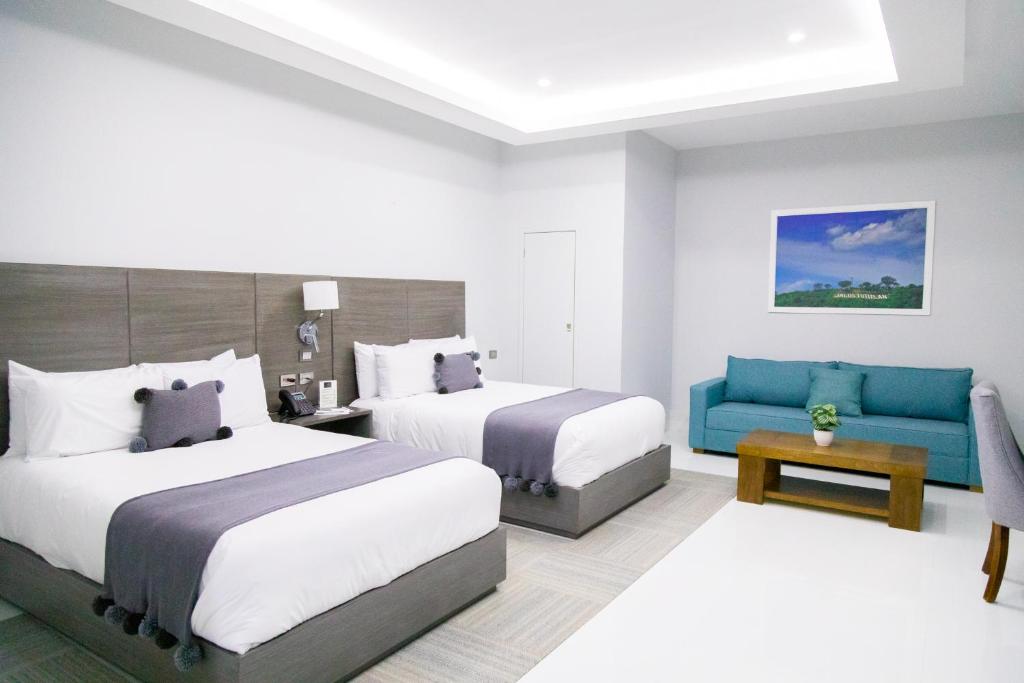Postel nebo postele na pokoji v ubytování Hotel GRALTA