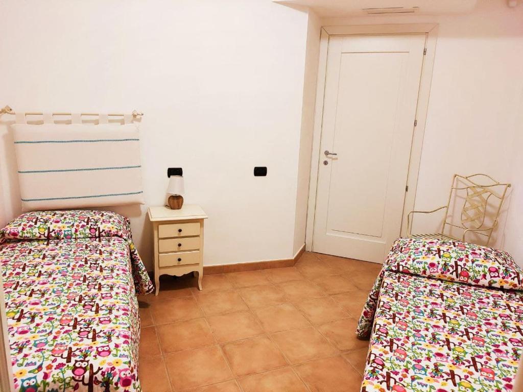 Postel nebo postele na pokoji v ubytování Pan Di Zucchero
