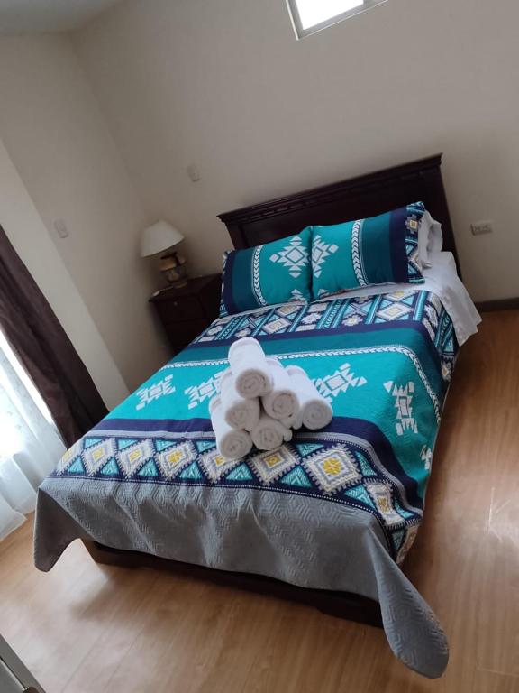 Postel nebo postele na pokoji v ubytování Dulce Hogar