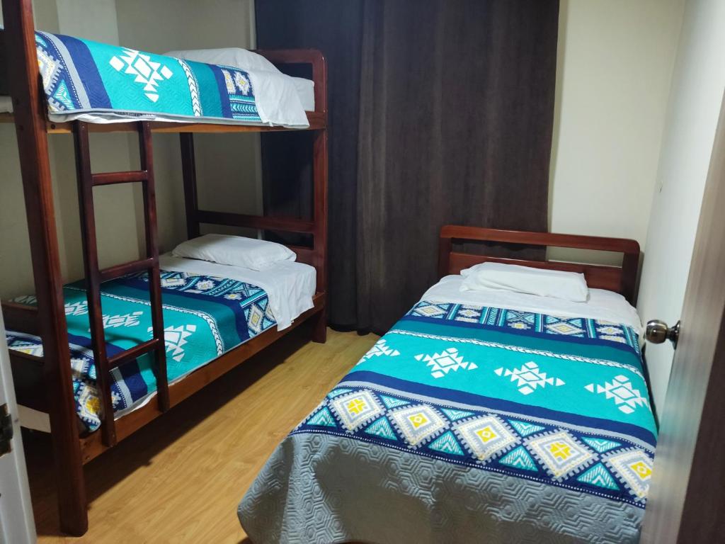 Postel nebo postele na pokoji v ubytování Dulce Hogar