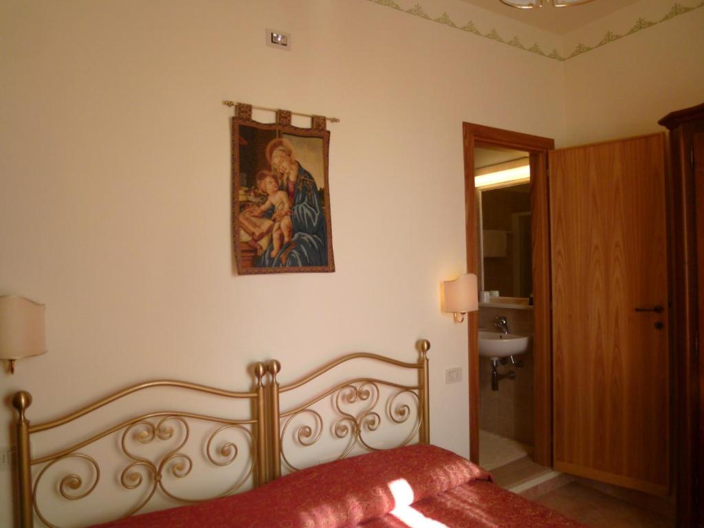 Postel nebo postele na pokoji v ubytování Casa Campiglione