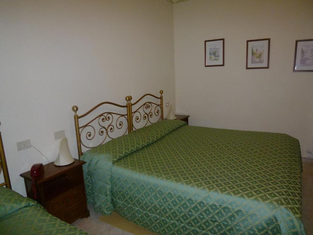 Postel nebo postele na pokoji v ubytování Casa Campiglione