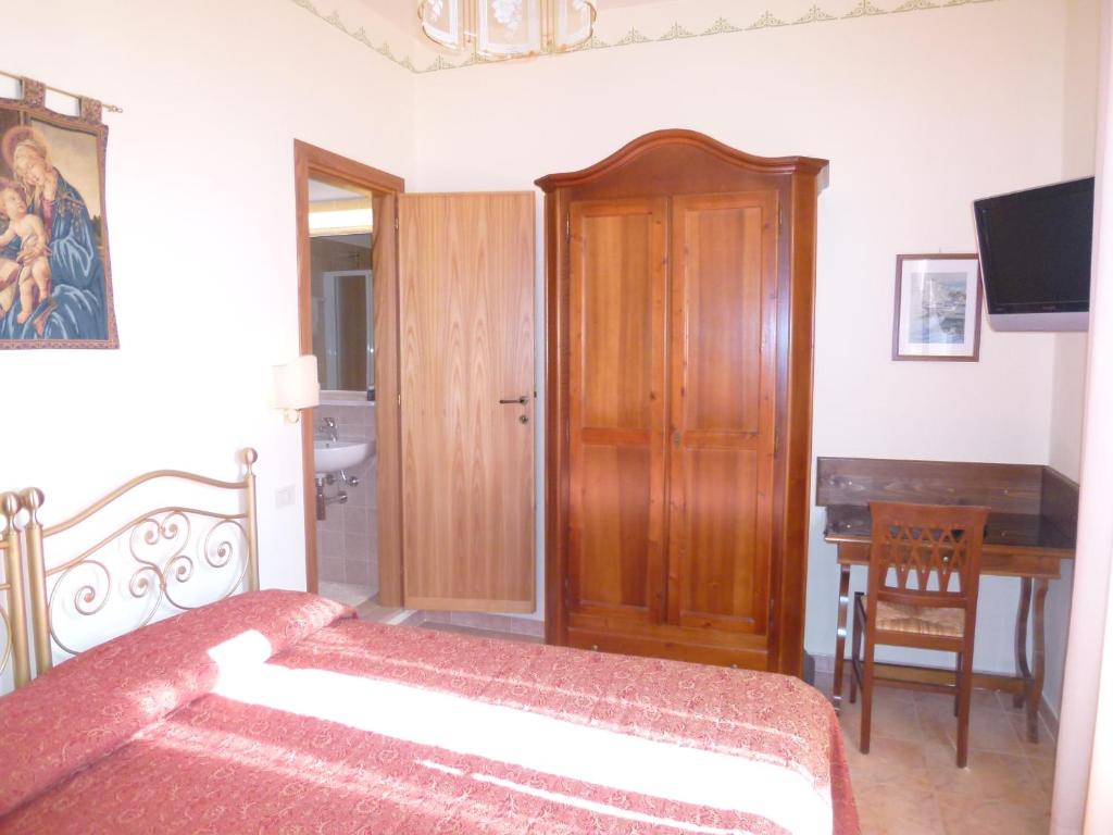 Postel nebo postele na pokoji v ubytování Casa Campiglione