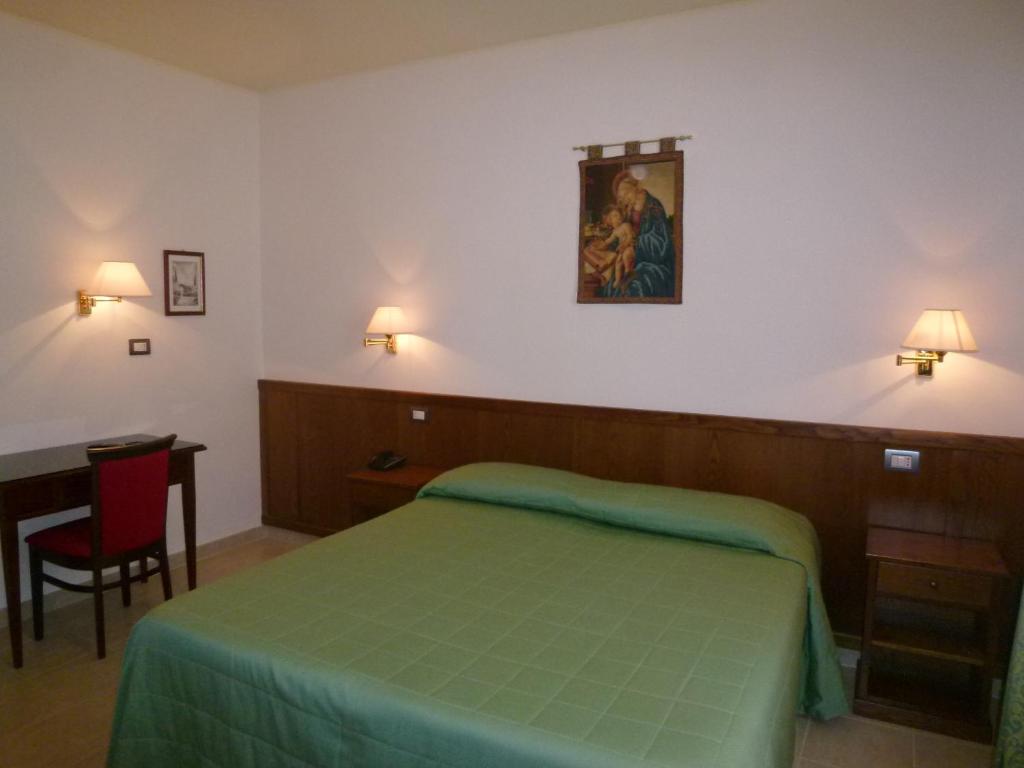 Postel nebo postele na pokoji v ubytování Casa Campiglione