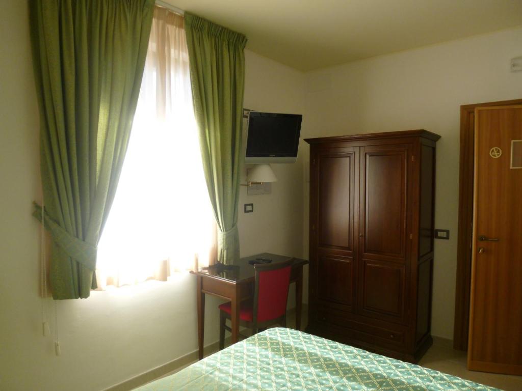 Postel nebo postele na pokoji v ubytování Casa Campiglione