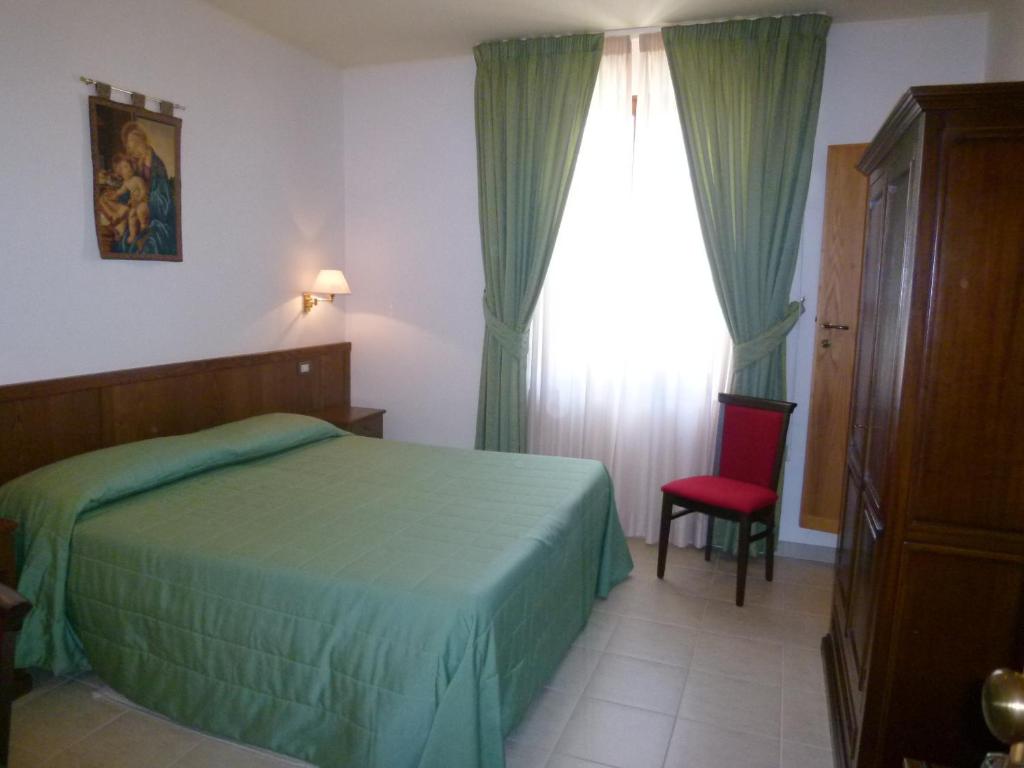 Postel nebo postele na pokoji v ubytování Casa Campiglione