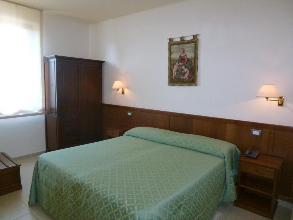 Postel nebo postele na pokoji v ubytování Casa Campiglione
