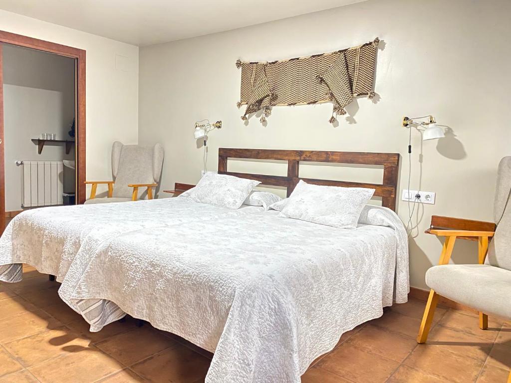 Postel nebo postele na pokoji v ubytování Casa Sara