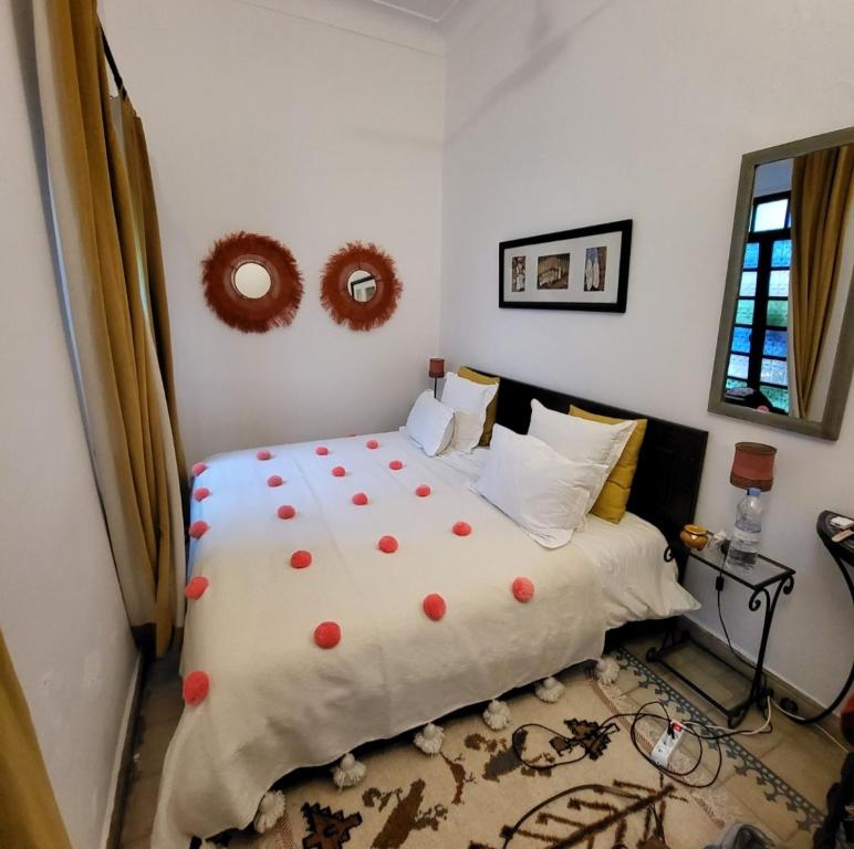 Postel nebo postele na pokoji v ubytování Riad Aloes & Spa