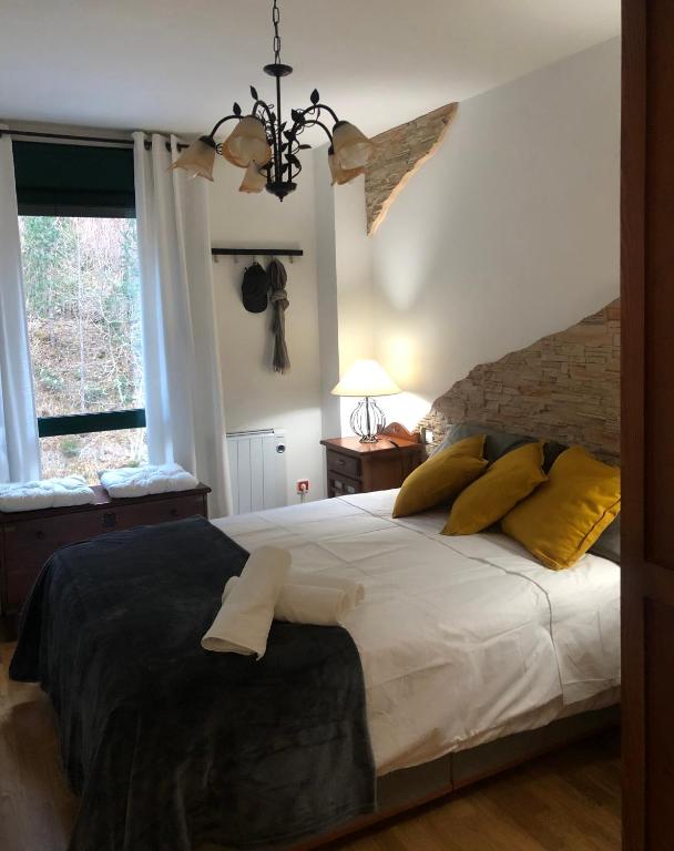 Postel nebo postele na pokoji v ubytování Apartamento Sauce