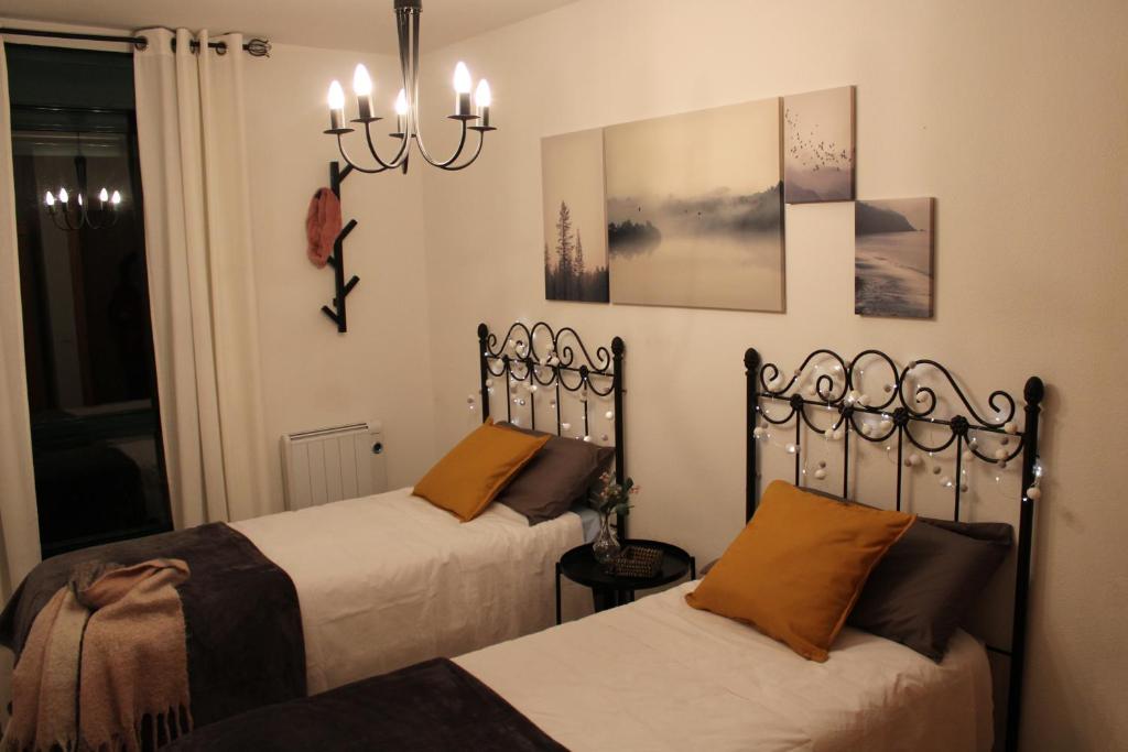 Postel nebo postele na pokoji v ubytování Apartamento Sauce