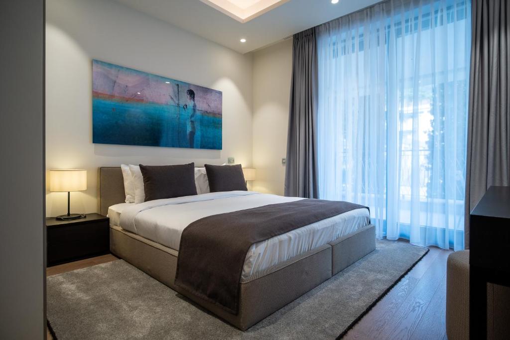 Postel nebo postele na pokoji v ubytování Paloma Apartment - Portonovi Resort