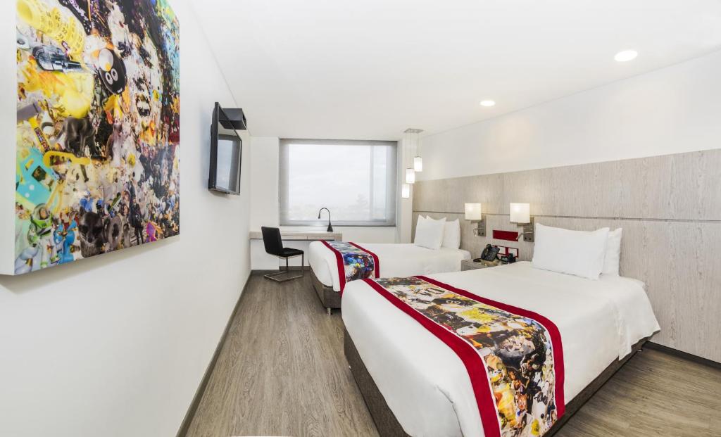 Postel nebo postele na pokoji v ubytování Hotel Black Tower Premium