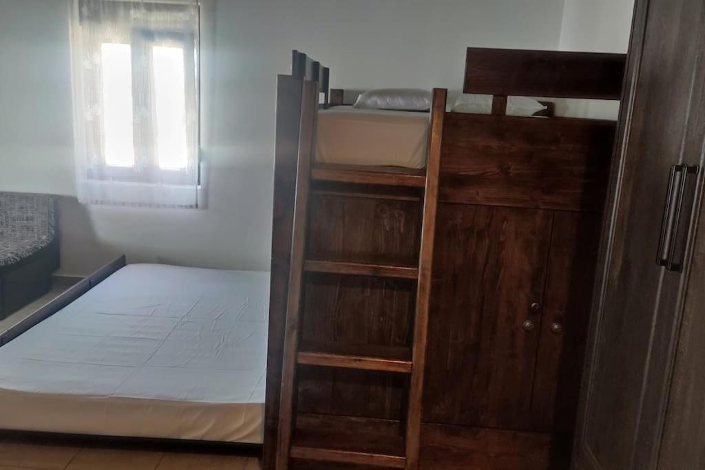 Posteľ alebo postele v izbe v ubytovaní Malakion Rustic Studio seaside view