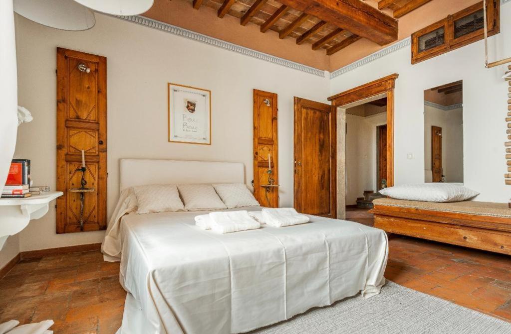 Postel nebo postele na pokoji v ubytování Villa San Filippo