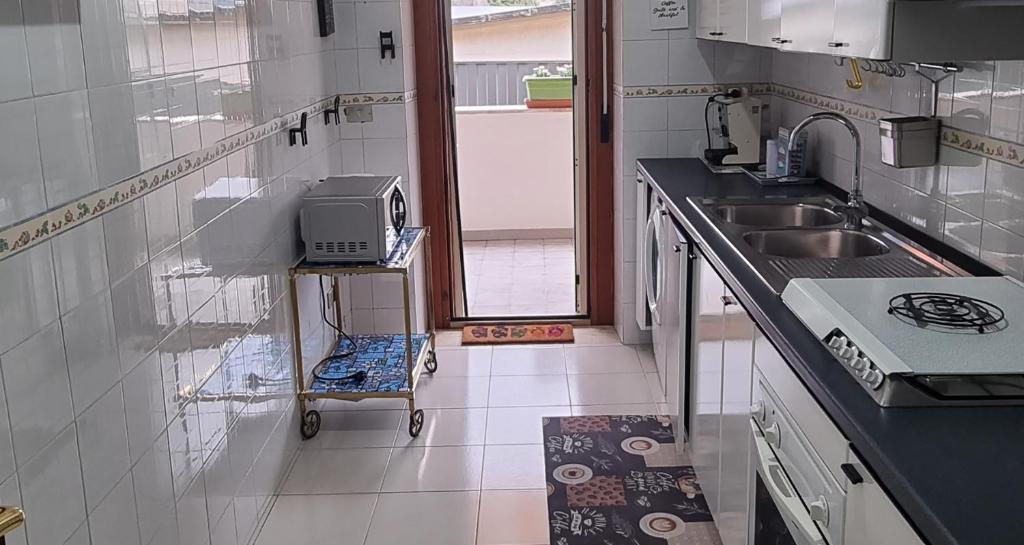 Kuchyň nebo kuchyňský kout v ubytování B&b Binario38