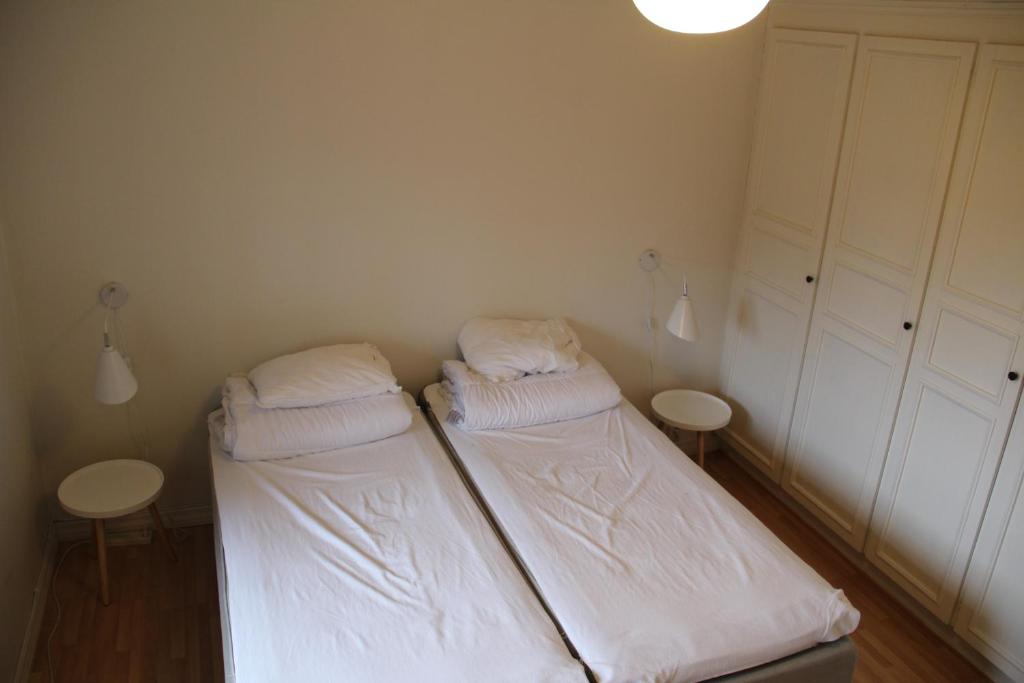 Postel nebo postele na pokoji v ubytování Villa Lägervik Vitsand