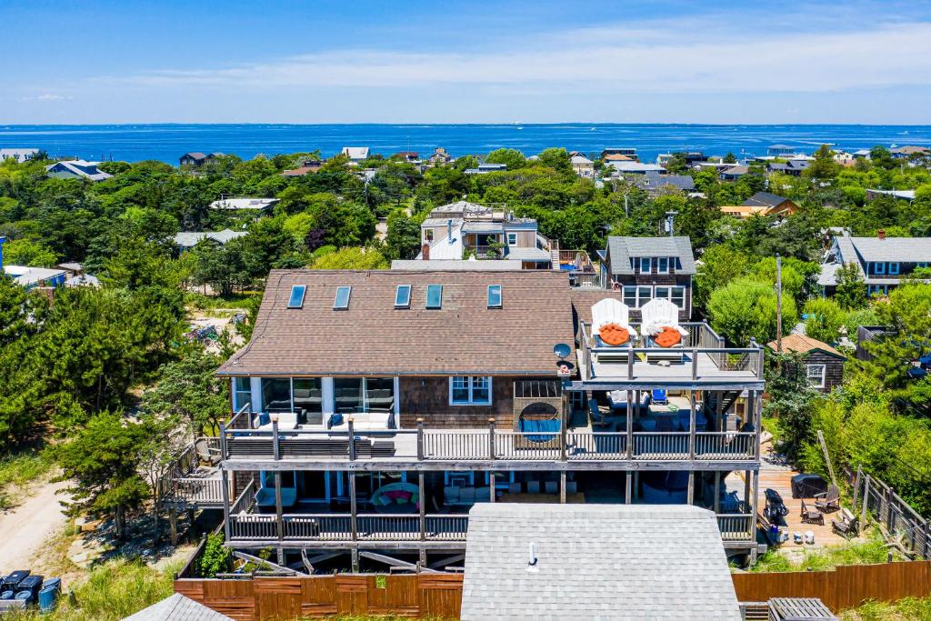 an aerial view of a large house with a balcony at 34 Champlain Unit 1 and Penthouse in Ocean Bay Park