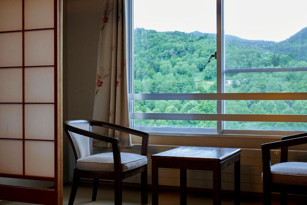 Nespecifikovaný výhled na hory nebo výhled na hory při pohledu z hotelu