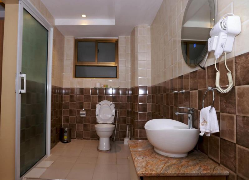 Koupelna v ubytování Hylise Hotel
