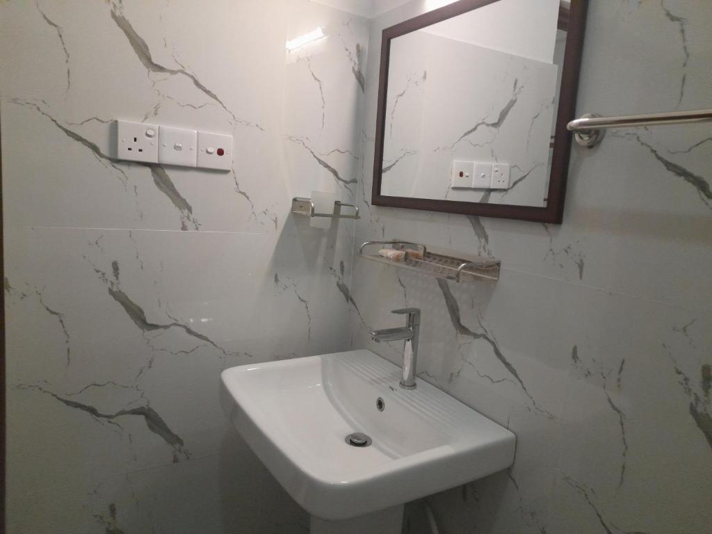 Koupelna v ubytování Gloria Inn
