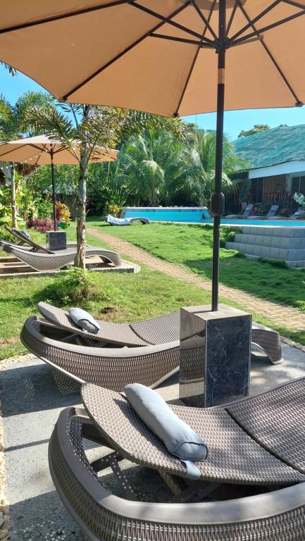 Bazén v ubytování Becano Restobar and Resort nebo v jeho okolí