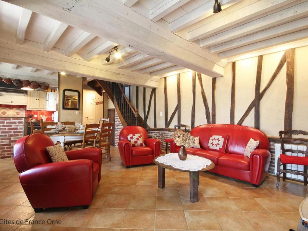 Część wypoczynkowa w obiekcie Maison 6 pers avec sauna et jardin, Suisse Normande - FR-1-497-172