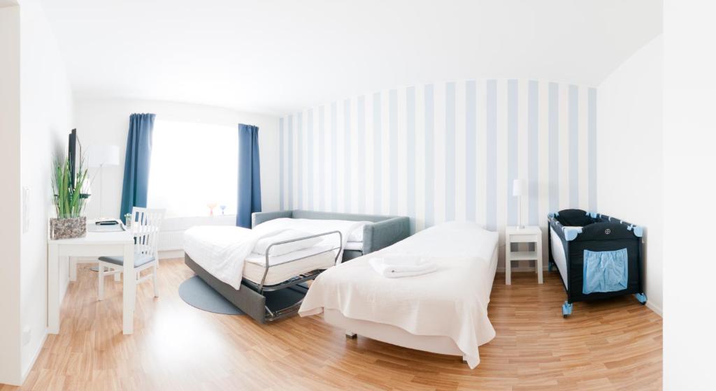 Postel nebo postele na pokoji v ubytování Attendo Park Hotell