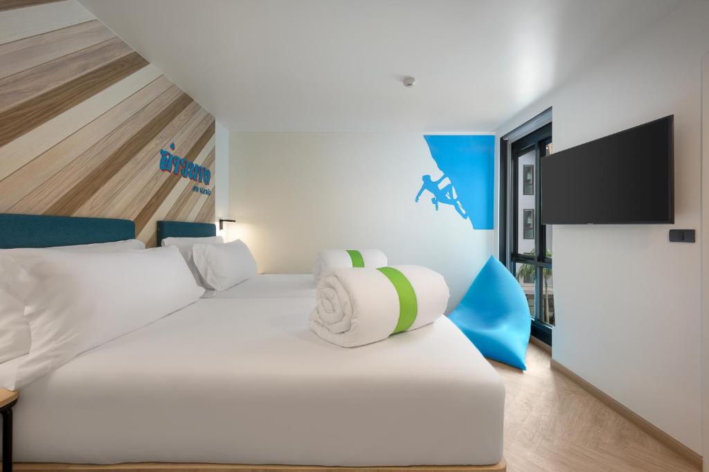 Posteľ alebo postele v izbe v ubytovaní COSI Krabi Ao Nang Beach - SHA Plus
