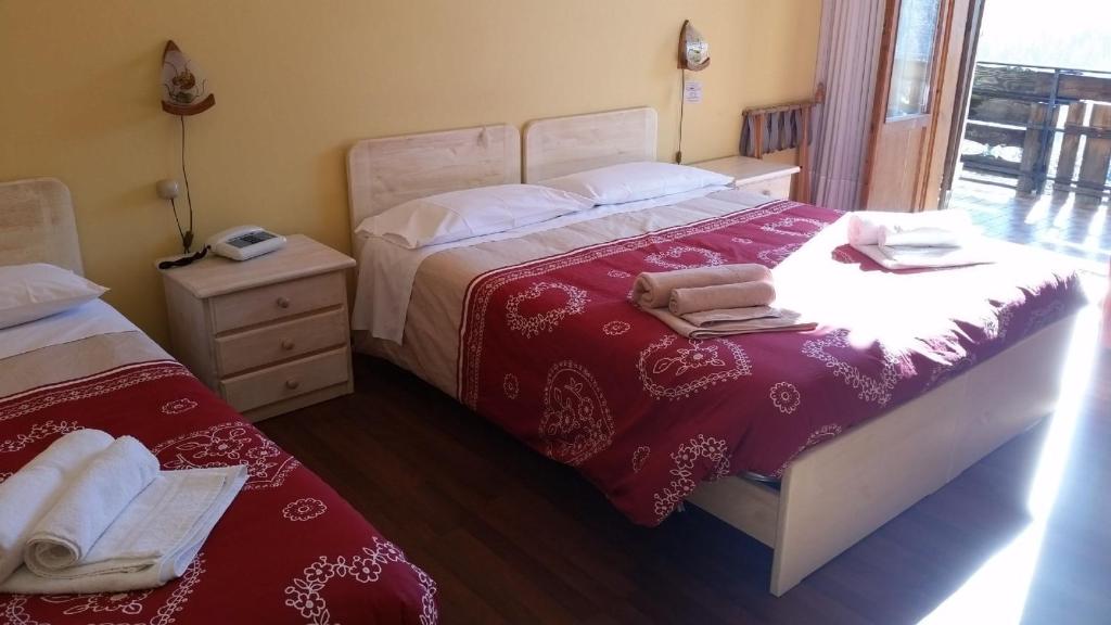 Postel nebo postele na pokoji v ubytování Albergo Bellavista